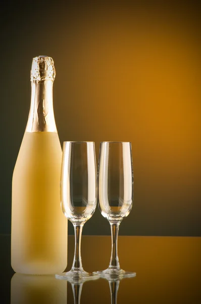 Champagne against color gradient background Royalty Free Stock Photos