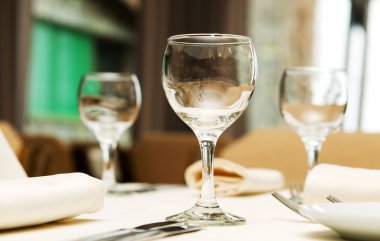 Wine glasses on the table - shallow depth of field clipart