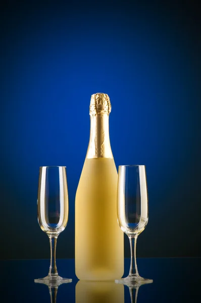 Champagne against color gradient background — Stock Photo, Image
