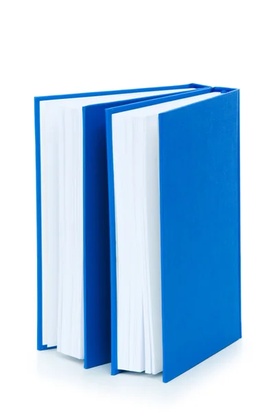 白で隔離される書籍のスタック — ストック写真