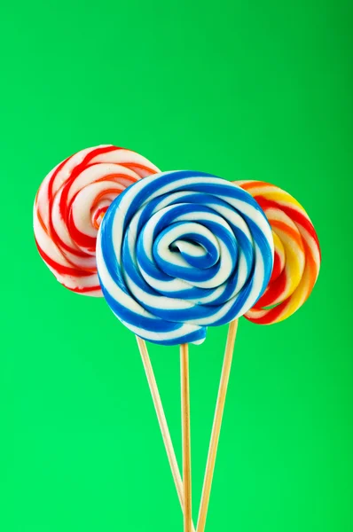 Colourful lollipop against the colourful background Stock Picture