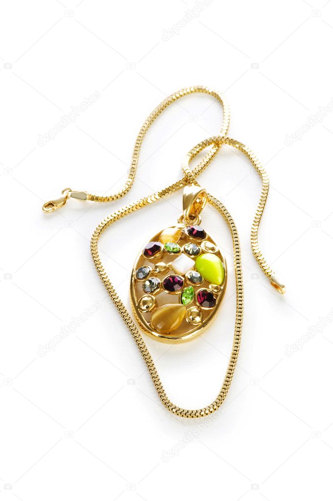 Golden chain and brooch isolated on white