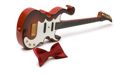 Guitar and bow tie isolated on the white clipart