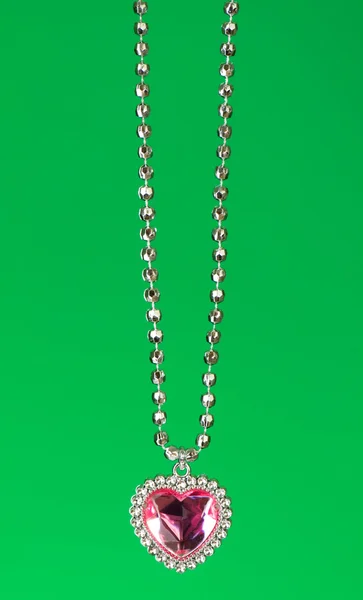 Silver hänge isolerad på den färgglada bakgrunden — Stockfoto