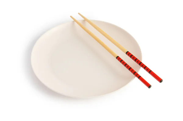 Conceito de comida asiática com prato e pauzinhos — Fotografia de Stock
