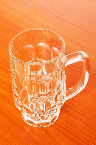Beer glass on the wooden table — Stock Photo, Image