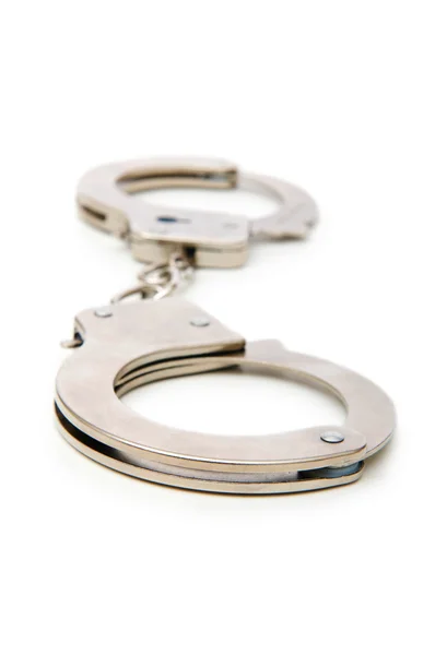 Metal handcuffs isolated on the white background — Stock Photo, Image