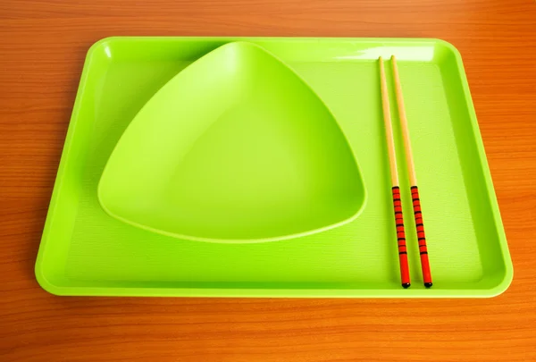 Концепція азіатської кухні з плитою і палички для їжі — стокове фото