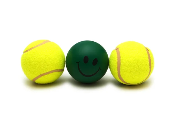 Palle da tennis e smilie isolato su bianco — Foto Stock