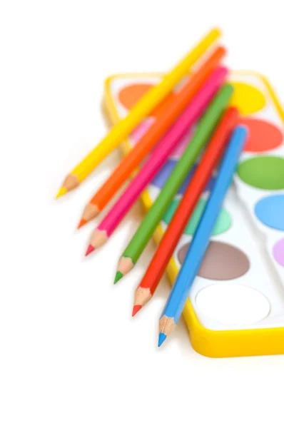 Palette and pencils isolated on the white — Stock Photo, Image
