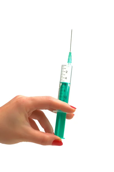 Hand holding syringe isolated on the white — Stock Photo, Image