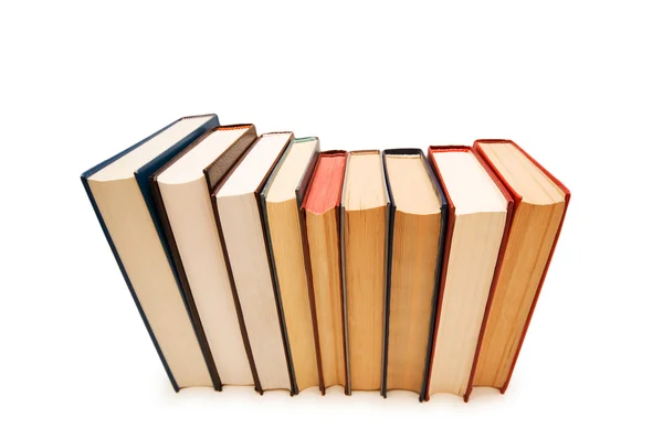 Bücherreihe isoliert auf weißem Hintergrund — Stockfoto