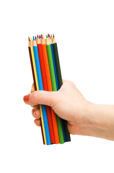 Hand met potloden geïsoleerd op de witte — Stockfoto