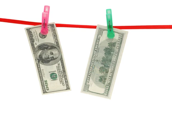 Conceito de lavagem de dinheiro - notas de dólar penduradas na corda — Fotografia de Stock
