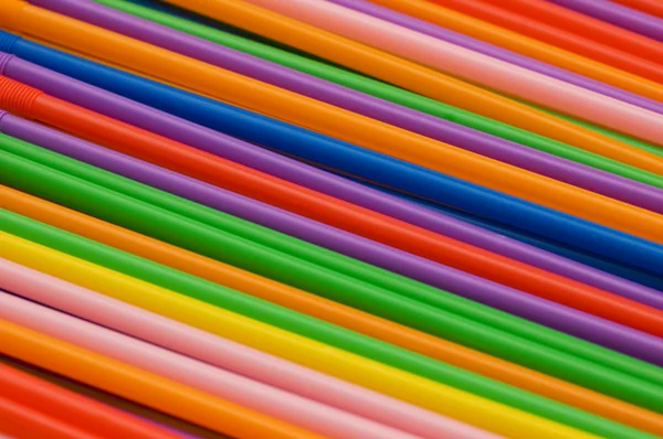 Massor av dricka sugrör i olika färger — Stockfoto