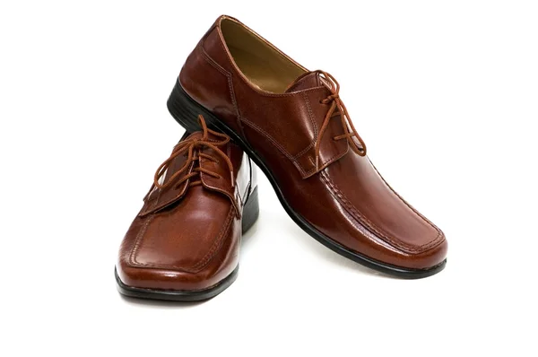Bruine schoenen geïsoleerd op de witte achtergrond — Stockfoto