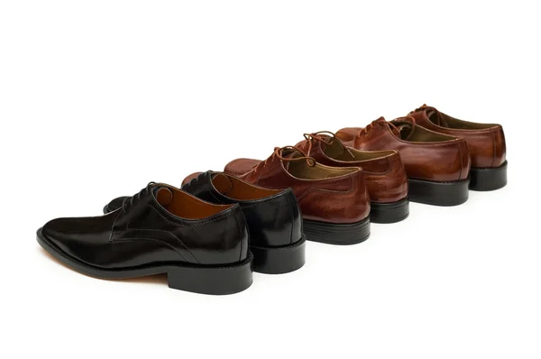 Verschillende mannen schoenen geïsoleerd op de witte — Stockfoto