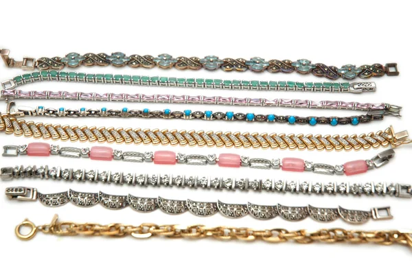 Various bracelets isolated on the white background — Stock Photo, Image