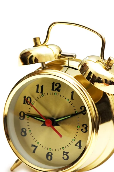 Relógio de alarme dourado isolado no branco — Fotografia de Stock