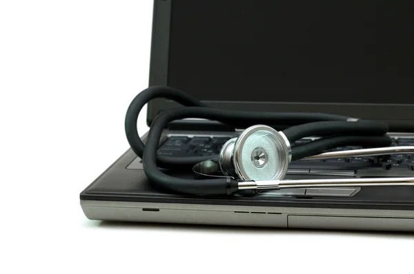 Stetoskop och laptop illustrerar begreppet digital säkerhet — Stockfoto