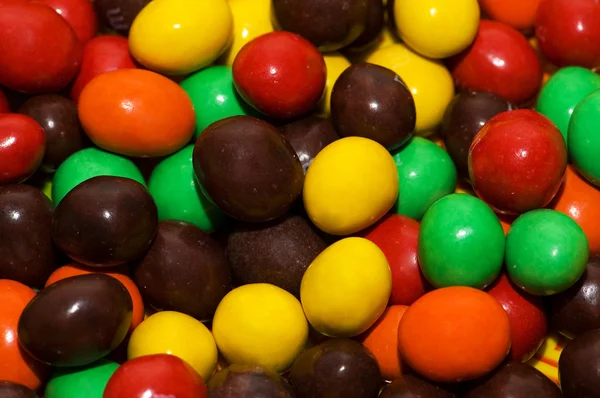 Çeşitli renkli tatlılar - arka plan olarak kullanılan — Stok fotoğraf