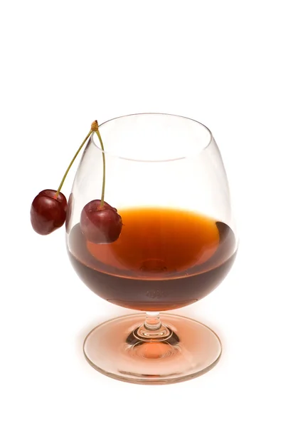Glass of wine and cherry isolated on white — Stock Photo, Image