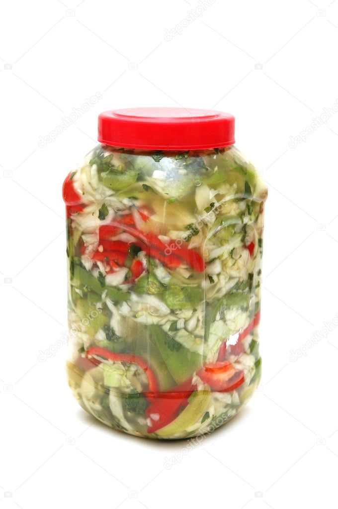 Jar with pickles isolated on the white background