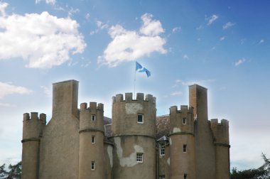 Ancient castle in Scotland on bright summer day clipart