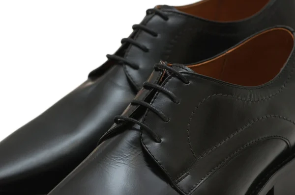 Μαύρα παπούτσια που απομονώνονται σε λευκό φόντο — Φωτογραφία Αρχείου