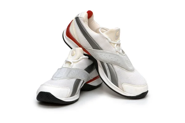 Zapatillas deportivas aisladas sobre fondo blanco — Foto de Stock