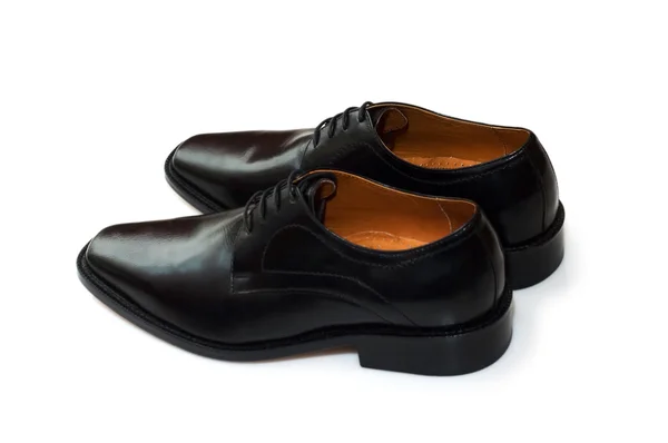 Чорні чоловічі туфлі ізольовані на білому — стокове фото