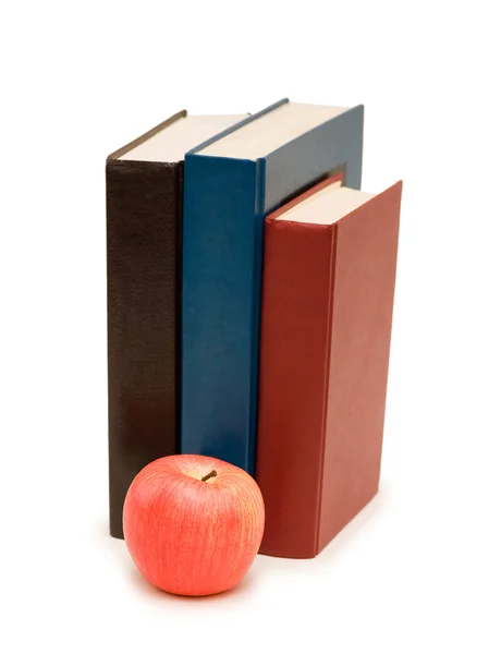 Tillbaka till skolan koncept med äpple och böcker — Stockfoto