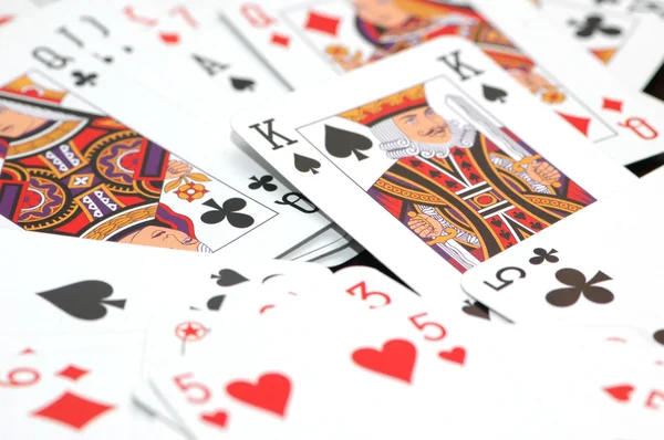 Lots of playing cards on the table — Stock Photo, Image