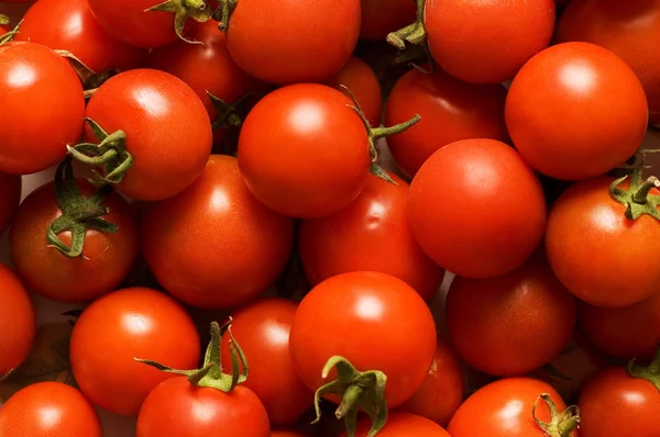 Röda tomater - kan användas som bakgrund — Stockfoto