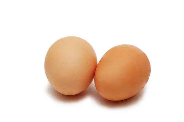 Zwei Eier isoliert auf weißem Hintergrund — Stockfoto