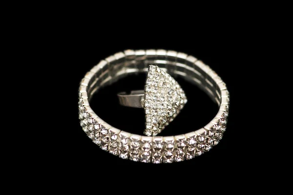 Bracelet and ring isolated on the white — Stock Photo, Image