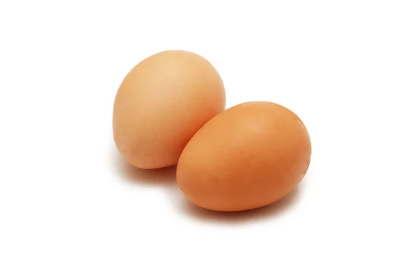 Zwei Eier isoliert auf weißem Hintergrund — Stockfoto