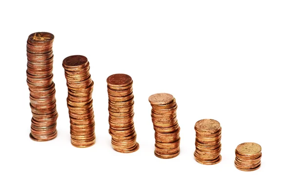 Pilhas de moedas isoladas no fundo branco — Fotografia de Stock