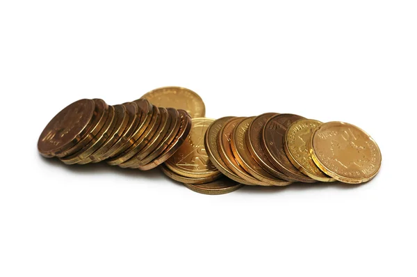 Monedas de oro aisladas sobre el fondo blanco —  Fotos de Stock