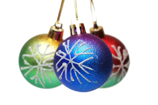Drie kerstballen geïsoleerd op de witte — Stockfoto