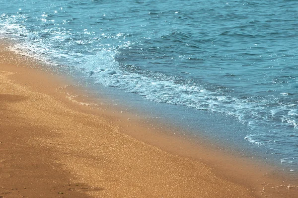 Agua y arena en la playa — Foto de Stock