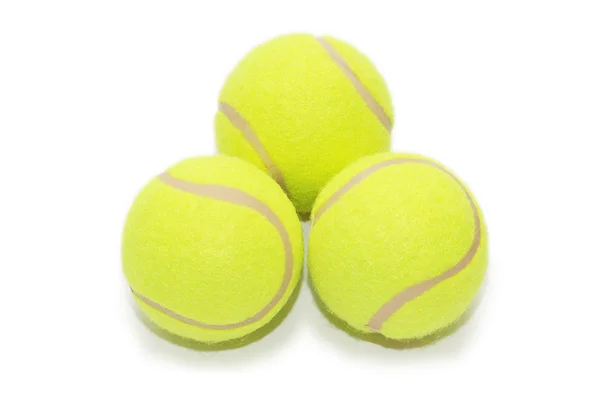 Три теннисных мяча изолированы на белом — стоковое фото