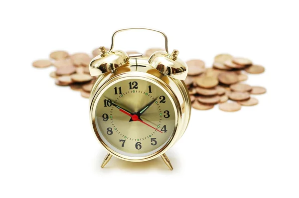 Концепція Time is money з годинником і монетами — стокове фото