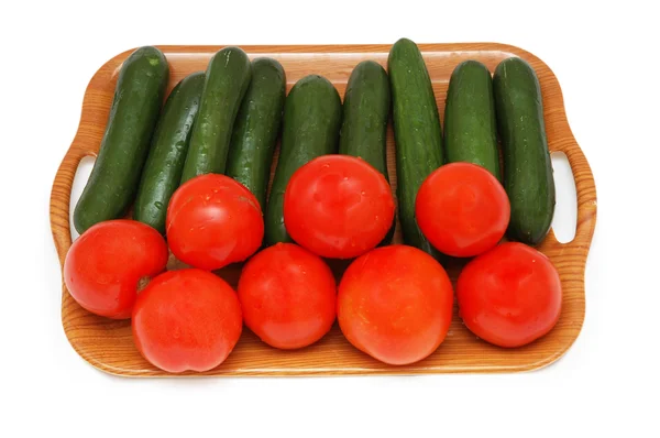 Cucumbers and tomatoes isolated on the white — Stock Photo, Image
