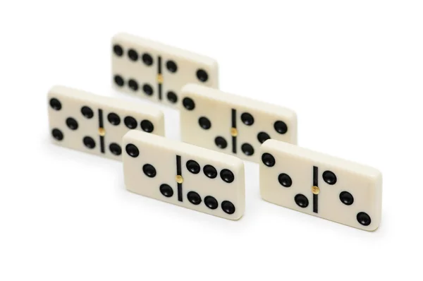 Effetto domino - domino isolato sul bianco — Foto Stock