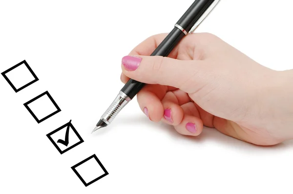 List of checkboxes and hand with pen — Stock Photo, Image