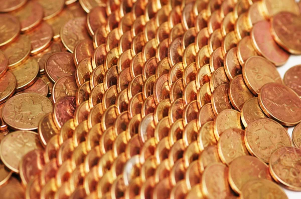 Rows of golden coins arranged as pattern — Stock Photo, Image