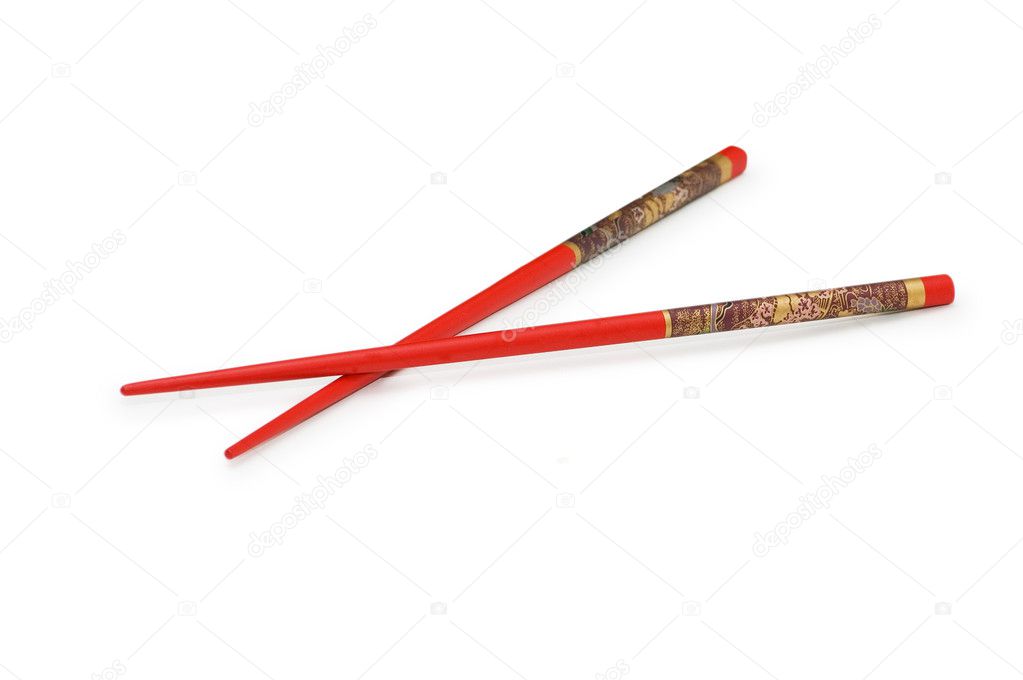 Red chopsticks isolated on the white background