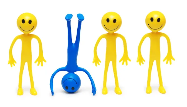 Stand out from the crowd" concept with smilies — Stock Photo, Image