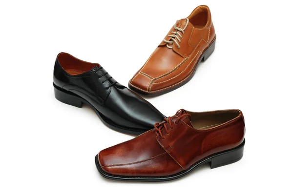 Çeşitli erkek ayakkabı seçimi üzerine beyaz izole — Stok fotoğraf